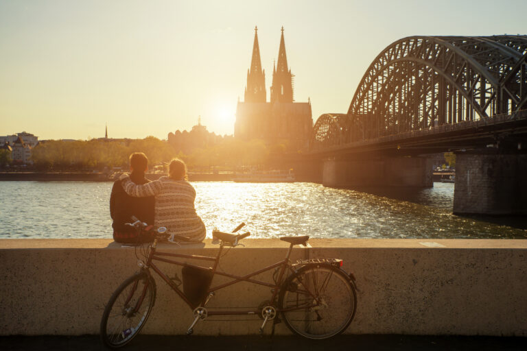 Young romantic couple spending their vacation in Cologne, German